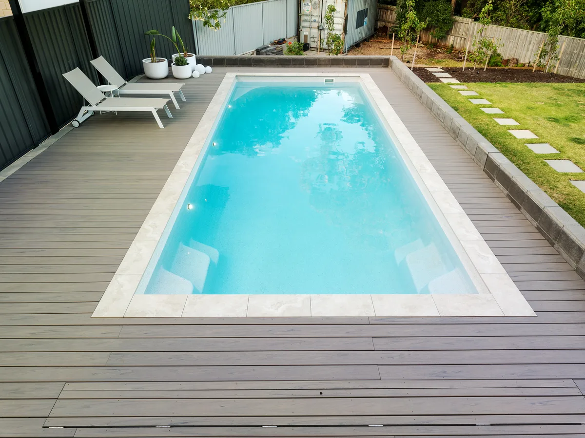 A completed fibreglass pool in a Karalee, QLD backyard showing finish and landscaping